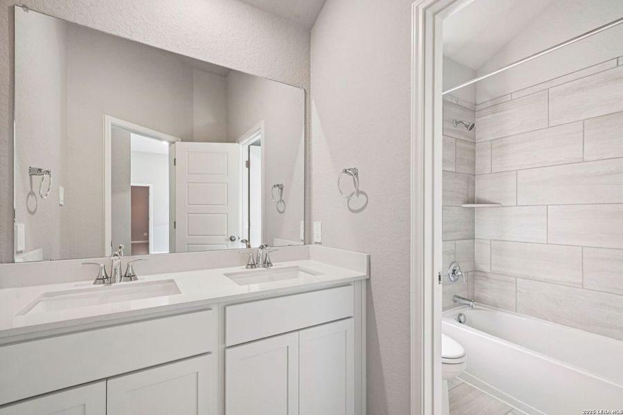 Furnished interior view inside a new home in Estancia Ranch - Classic Series, San Antonio (Image 16). Furnished interior view inside a new home in Estancia Ranch - Classic Series, San Antonio (Image 16).