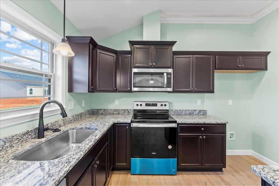 Representative furnished interior of a home built from the Rozlynn by Enchanted Homes in New Prospect Haven, Inman (Image 7).