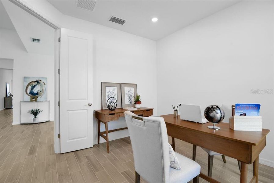 Furnished interior view inside a new home in Ardisia Park, New Smyrna Beach (Image 11).