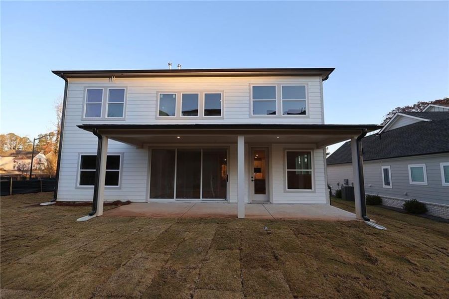 Exterior details and patio area of a home in Havencroft, Woodstock (Image 2). Exterior details and patio area of a home in Havencroft, Woodstock (Image 2).
