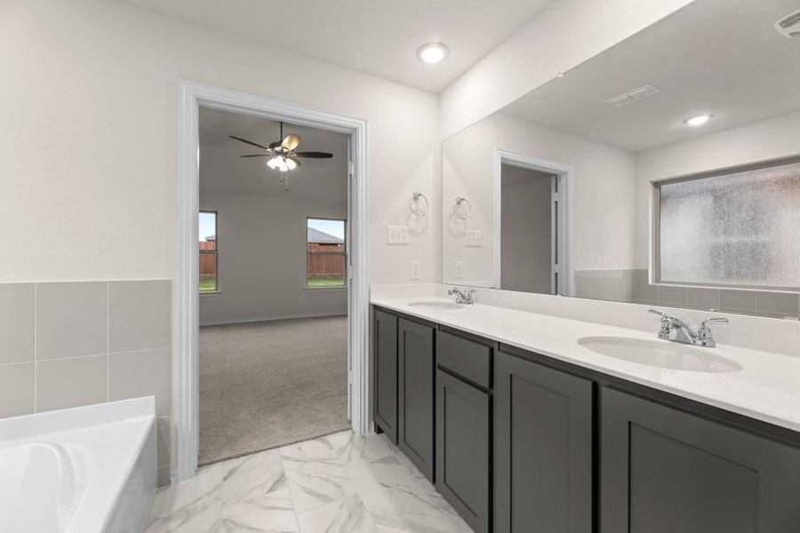 Representative exterior photo of a completed home built from the Lexington by Impression Homes in Baker Farms, Cleburne, TX (Image 18).