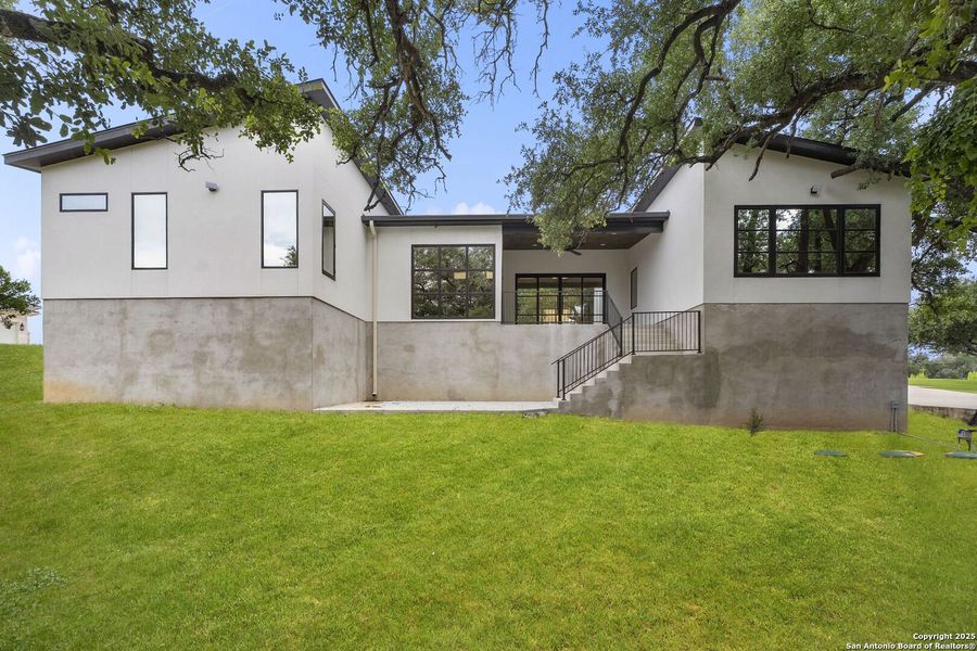 Front exterior of a new home in , San Antonio, TX, highlighting curb appeal (Image 24).