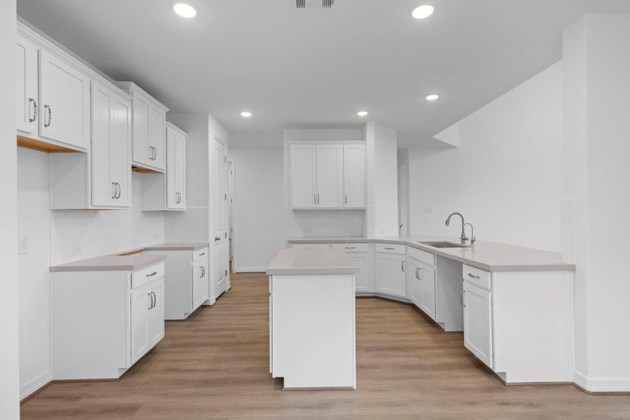 This kitchen is not only a functional space but also has ample storage. Whether you're a seasoned chef or just love to gather and enjoy good food, this kitchen is a dream come true.