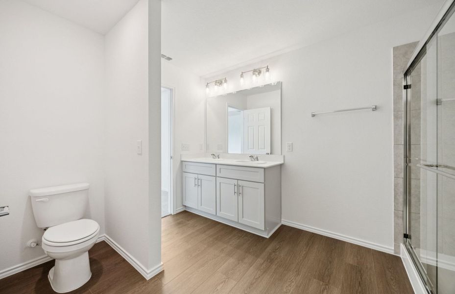 Representative furnished interior of a home built from the Camelia by Centex in Mobberly Farms, Pilot Point (Image 7).