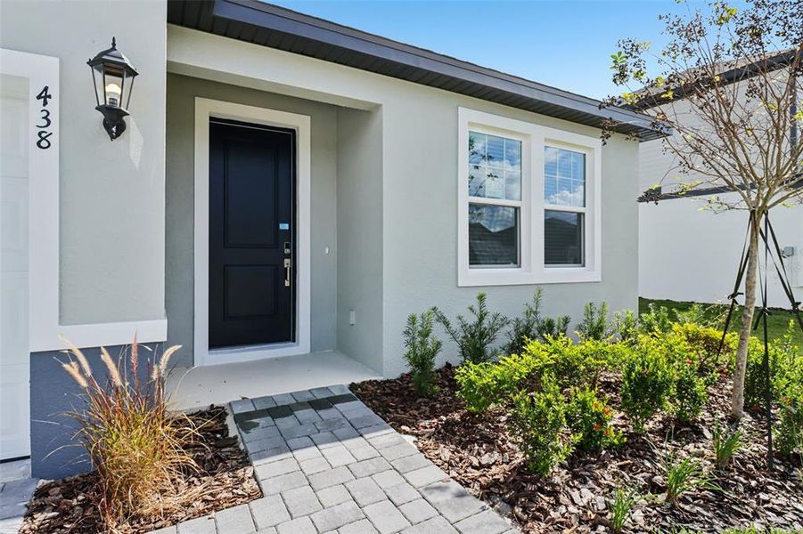 Exterior details and patio area of a home in Ridgehaven - Reserve Series, Ormond Beach (Image 23).