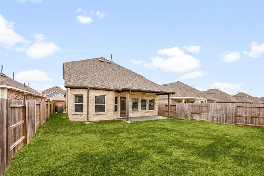 Exterior details and patio area of a home in Marvida, Cypress (Image 25).