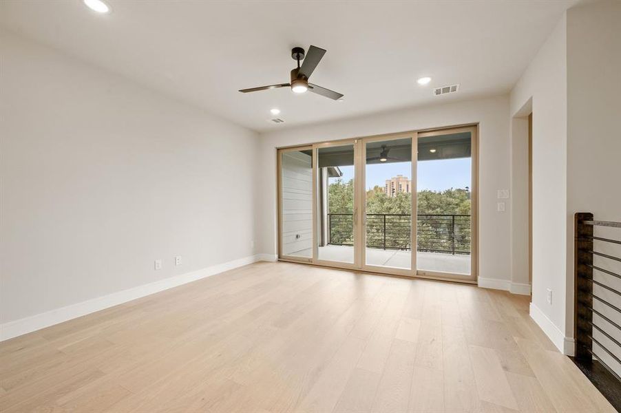 This spacious game room paired with a covered, outdoor deck creates the perfect entertainment zone.