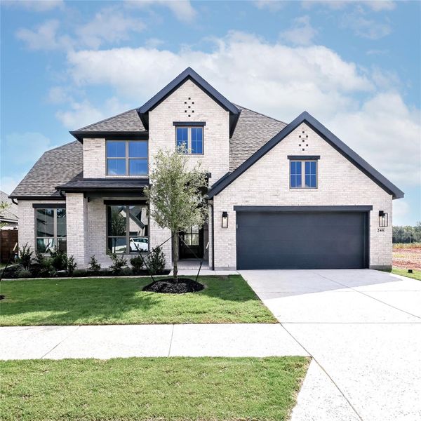 Front exterior of a new home in Juniper Springs, Lockhart, TX, highlighting curb appeal (Image 18).