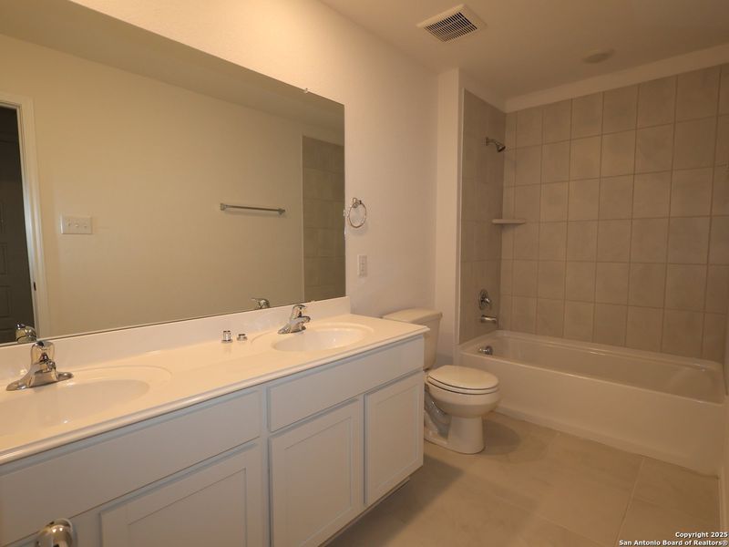Furnished interior view inside a new home in Greenspoint Heights, Seguin (Image 6).