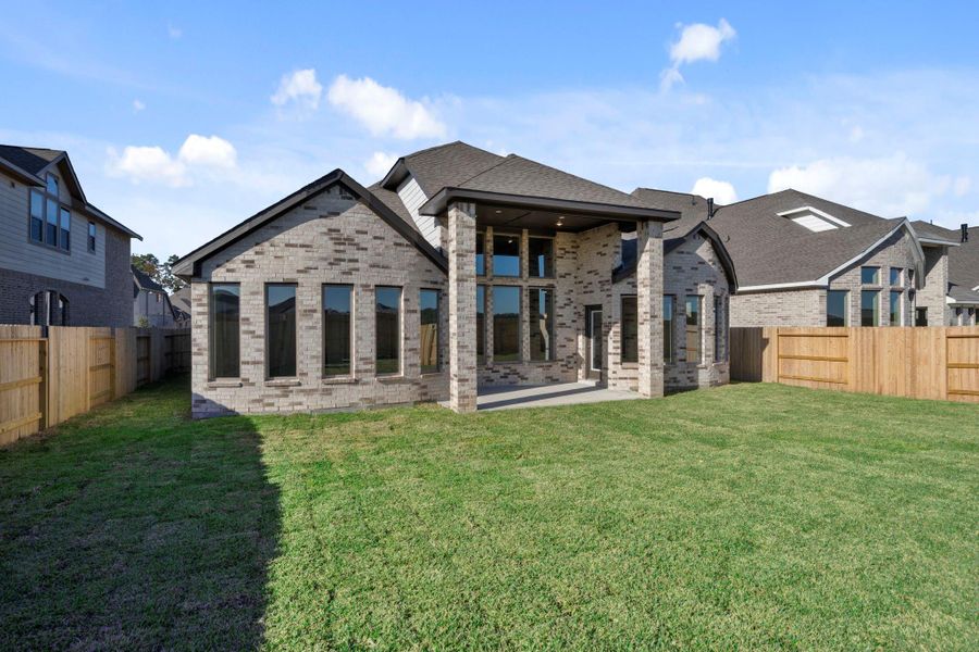 Exterior details and patio area of a home in The Meadows at Imperial Oaks 60', Conroe (Image 24).