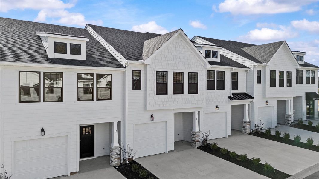 Front exterior of a new home in Gresham Station, Simpsonville, SC, highlighting curb appeal (Image 20).