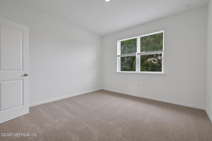 Spacious, unfurnished interior of a new home in The Hammock at Palm Harbor, Palm Coast (Image 17).