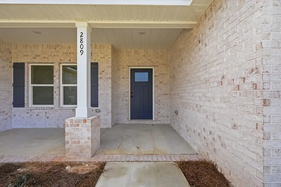 Exterior details and patio area of a home in Barton's Bend, Crestview (Image 3). Exterior details and patio area of a home in Barton's Bend, Crestview (Image 3).
