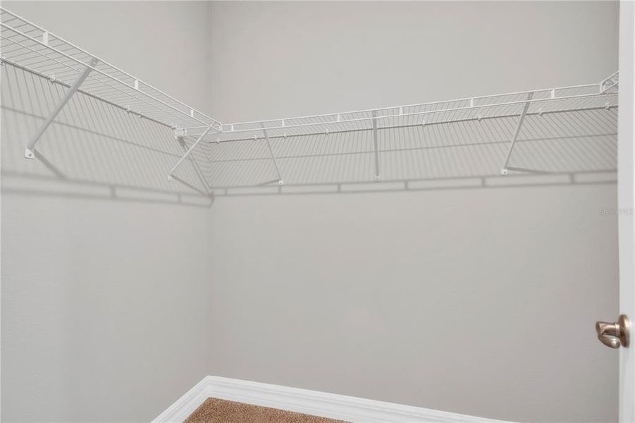 Owner's Suite Walk In His/Her Closets