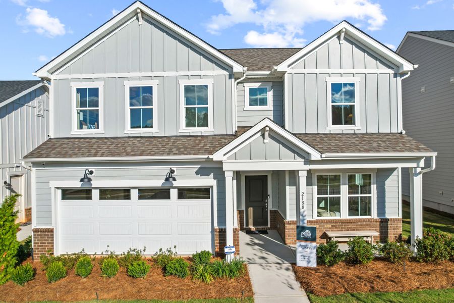 Representative exterior photo of a completed home built from the Austin by Pulte Homes in The Retreat at Carolina Ridge, Harrisburg, NC (Image 24). Representative exterior photo of a completed home built from the Austin by Pulte Homes in The Retreat at Carolina Ridge, Harrisburg, NC (Image 24).