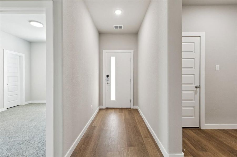 Entryway in the Emmy II home plan by Trophy Signature Homes - REPRESENTATIVE PHOTO Entryway in the Emmy II home plan by Trophy Signature Homes - REPRESENTATIVE PHOTO