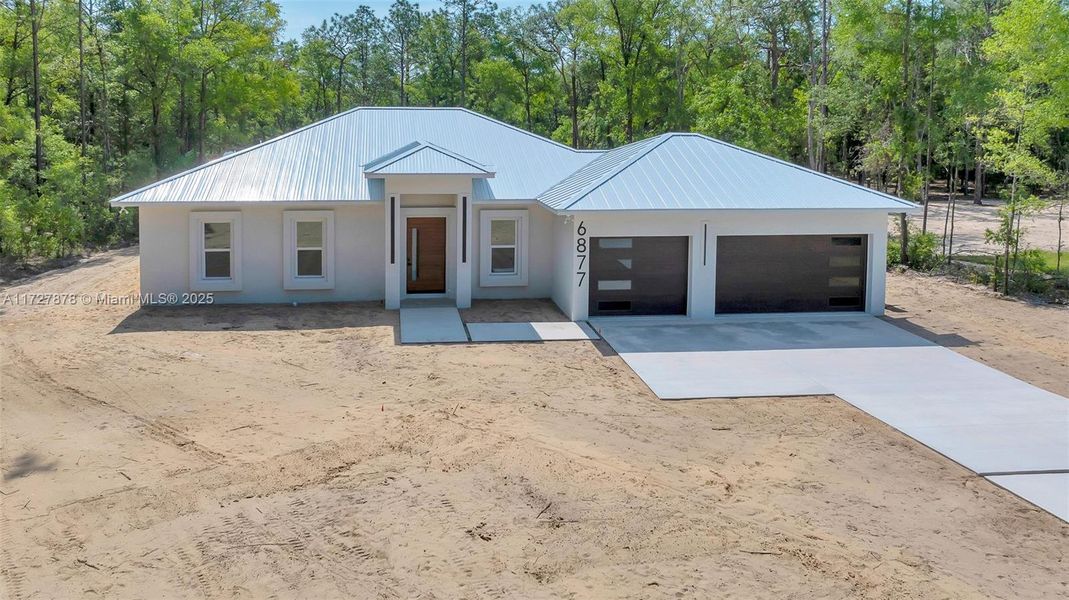 HYDRO-SEEDING LAWN AND IRRIGATION SYSTEM IN PLACE