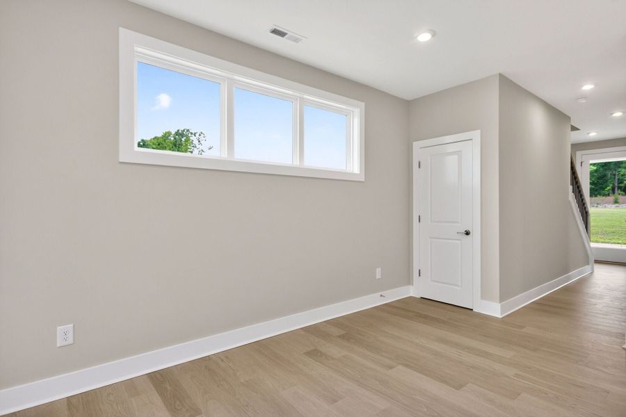 Representative unfurnished interior of a home built from the Ember B by Homes by Dickerson in Chatham Park, Pittsboro (Image 12).