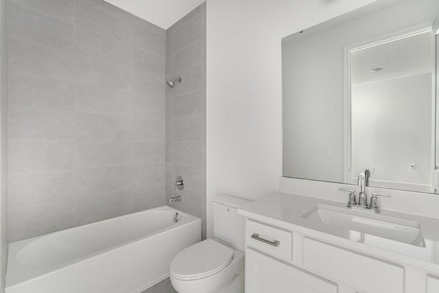 Furnished interior view inside a new home in Harvest at Ovation, Winter Garden (Image 15).