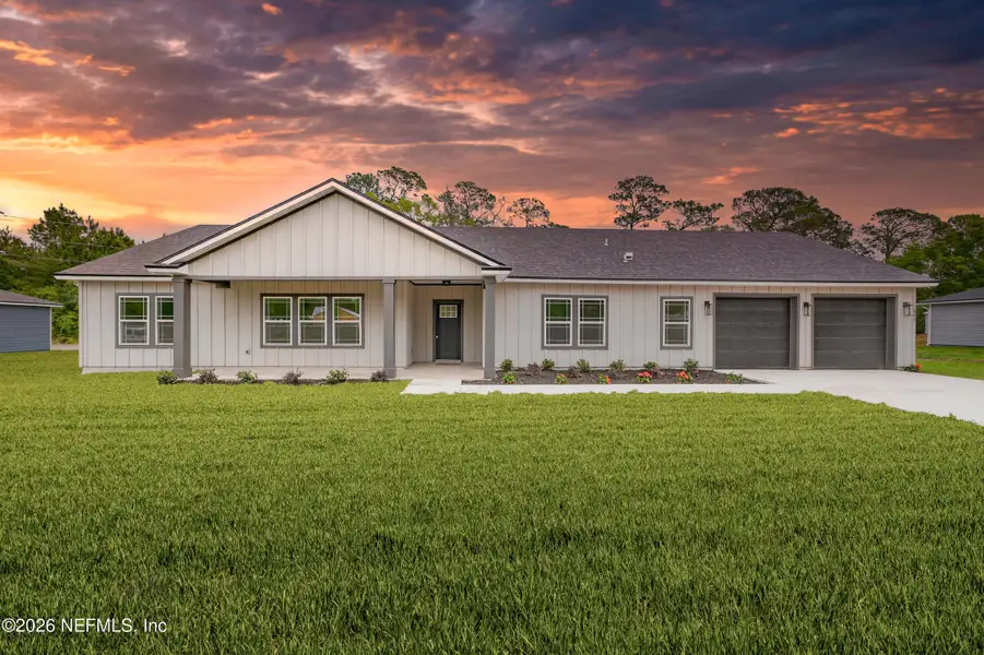 Front exterior of a new home in , Palatka, FL, highlighting curb appeal (Image 1). Front exterior of a new home in , Palatka, FL, highlighting curb appeal (Image 1).