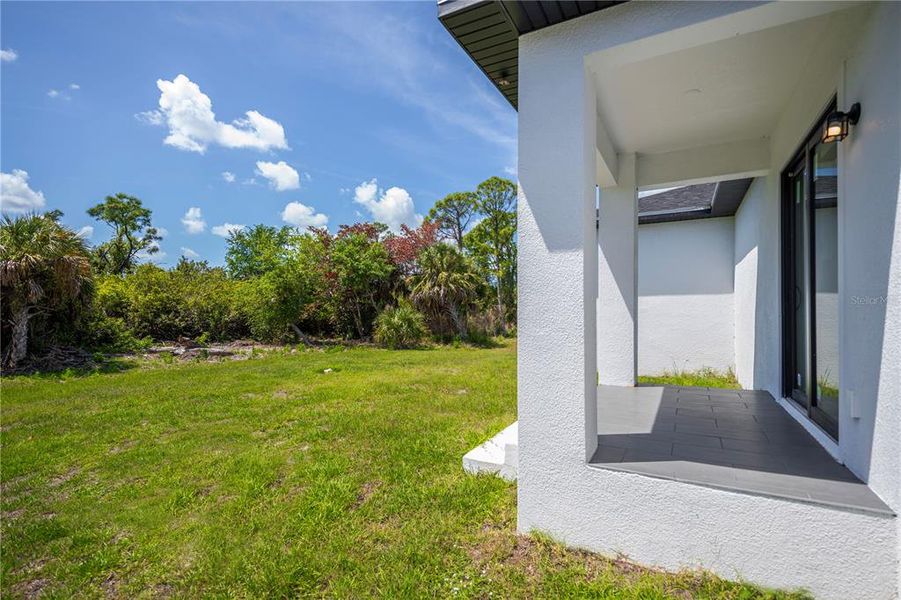 Exterior details and patio area of a home in , Port Charlotte (Image 31).