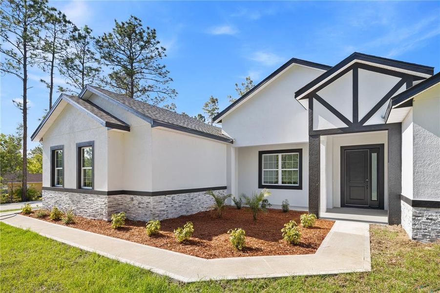 Front exterior of a new home in , Ocala, FL, highlighting curb appeal (Image 30).