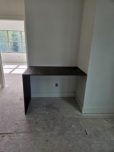 Upstairs built-in desk area, ideal for a home office or study space.