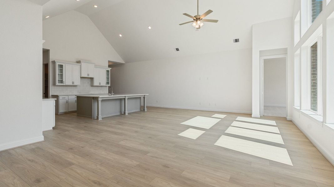 Representative furnished interior of a home built from the Vanderbilt by DRB Homes in Creekhaven, Iowa Colony (Image 8).