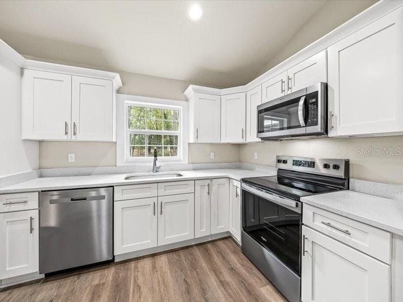 Furnished interior view inside a new home in , Ocala (Image 9).