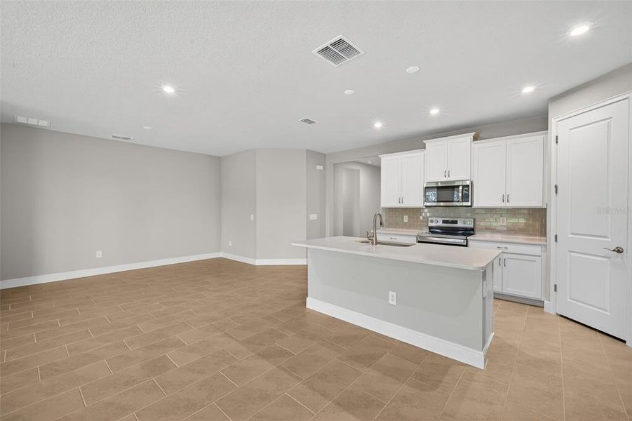 Furnished interior view inside a new home in Windwater, Parrish (Image 12).