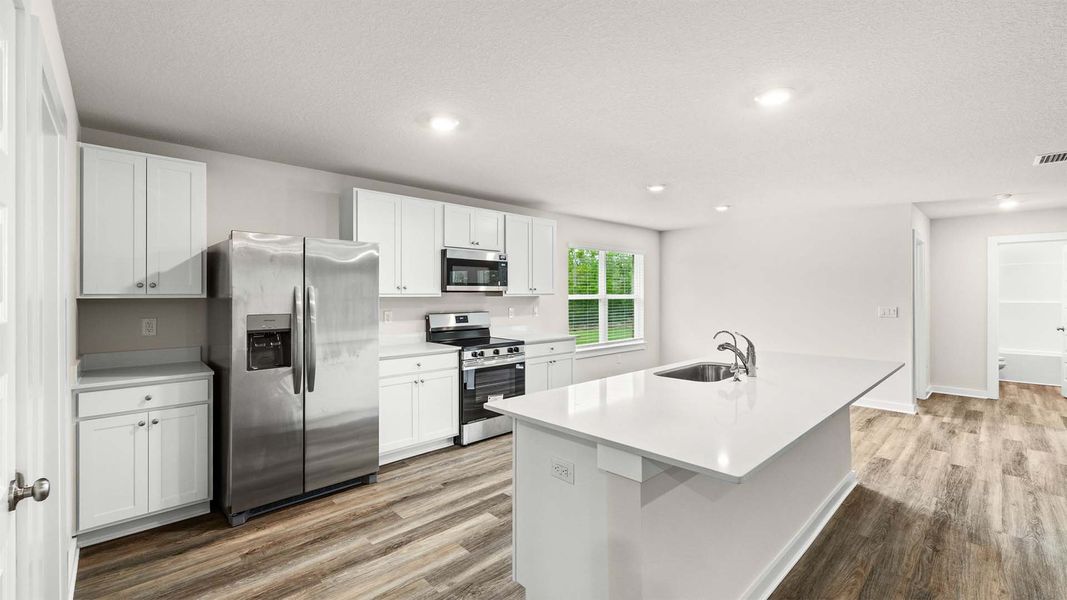 Furnished interior view inside a new home in Sunny Hills, Chipley (Image 6).