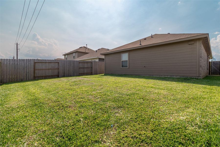 Front exterior of a new home in Burnet Fields at Baytown Crossings, Baytown, TX, highlighting curb appeal (Image 1). Front exterior of a new home in Burnet Fields at Baytown Crossings, Baytown, TX, highlighting curb appeal (Image 1).