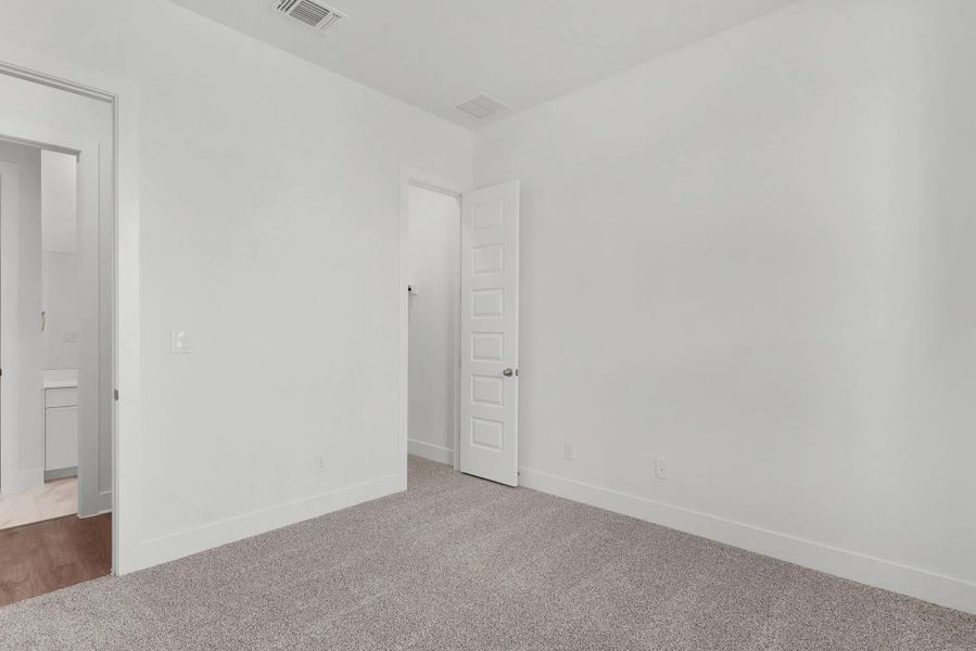 Representative unfurnished interior of a home built from the Acadia by Chesmar Homes in University Heights, McKinney (Image 10).
