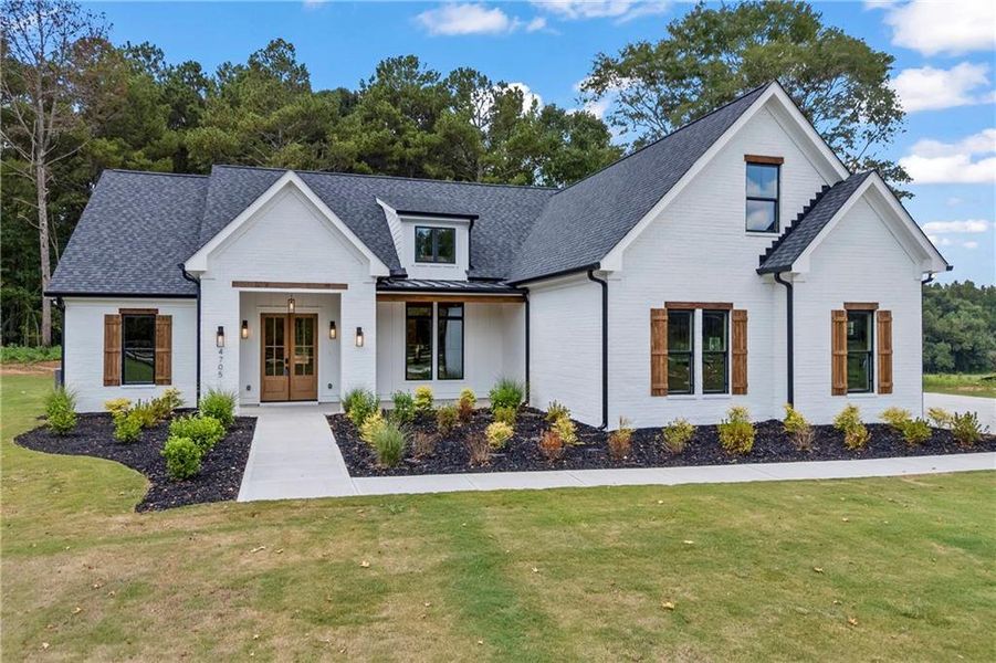 Front exterior of a new home in , Covington, GA, highlighting curb appeal (Image 31).