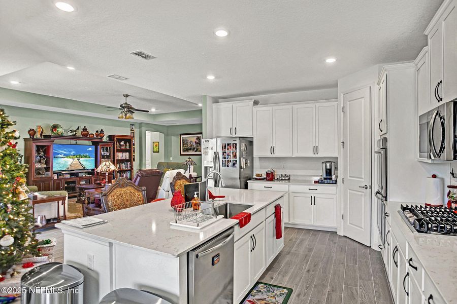 Furnished interior view inside a new home in Tributary: Lakeview at Tributary 60's, Yulee (Image 6).