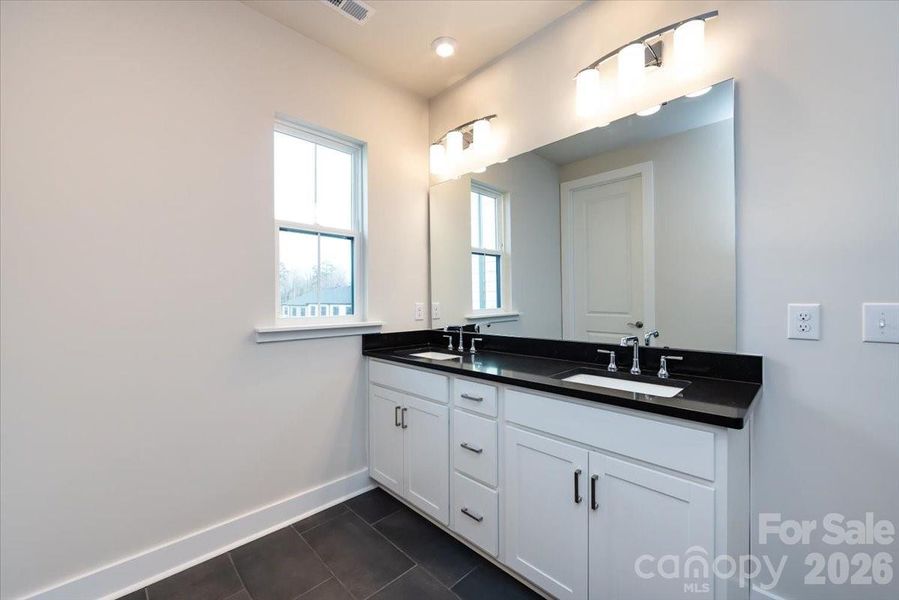 Dual Vanity Primary Bathroom
