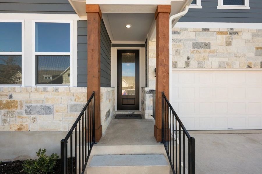 Exterior details and patio area of a home in Cannon Ranch, Dripping Springs (Image 3).