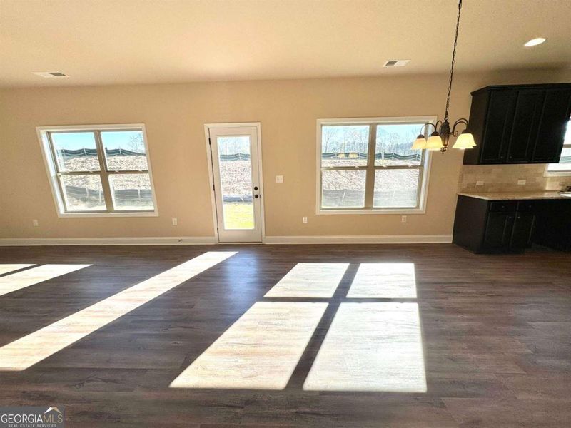 Spacious, unfurnished interior of a new home in Garden Walk, Jackson (Image 16).