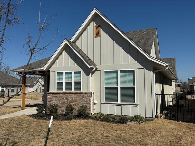 Front exterior of a new home in , Granbury, TX, highlighting curb appeal (Image 21). Front exterior of a new home in , Granbury, TX, highlighting curb appeal (Image 21).