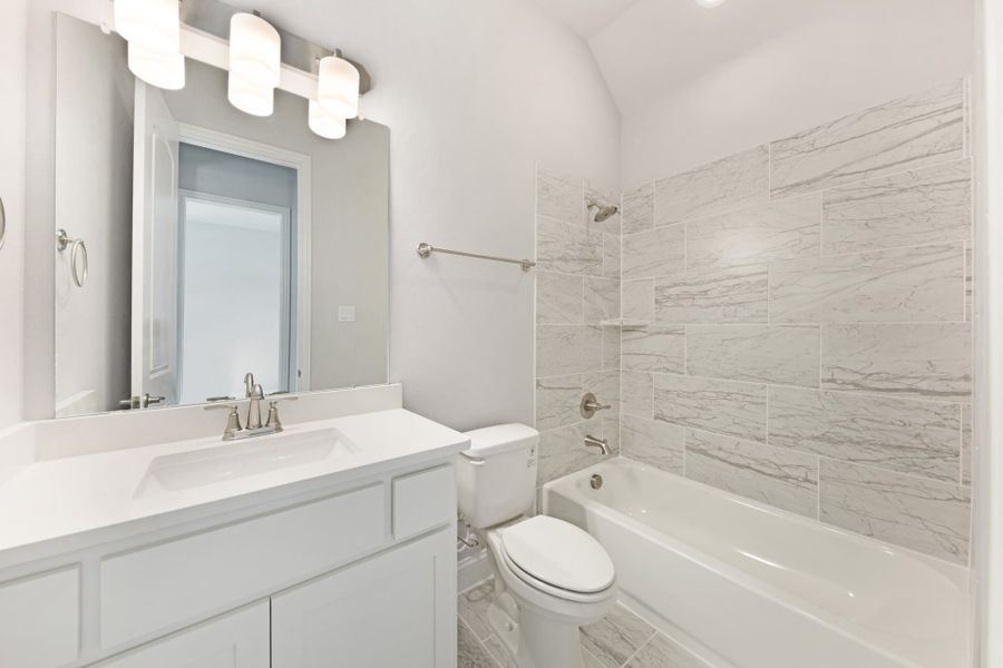 Representative furnished interior of a home built from the Bridgeport by UnionMain Homes in Lake Breeze, Lavon (Image 6).
