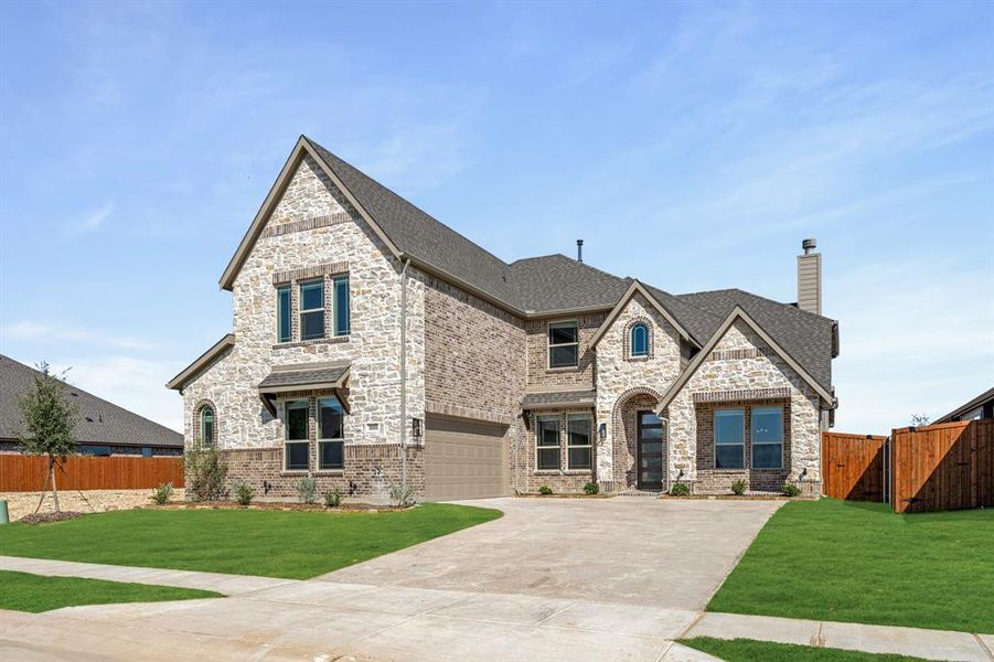 Front exterior of a new home in Timberbrook 3B-4A, Justin, TX, highlighting curb appeal (Image 15). Front exterior of a new home in Timberbrook 3B-4A, Justin, TX, highlighting curb appeal (Image 15).