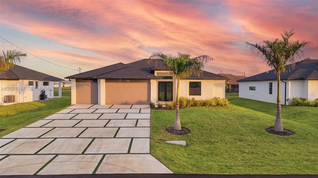 Front exterior of a new home in , Cape Coral, FL, highlighting curb appeal (Image 26).