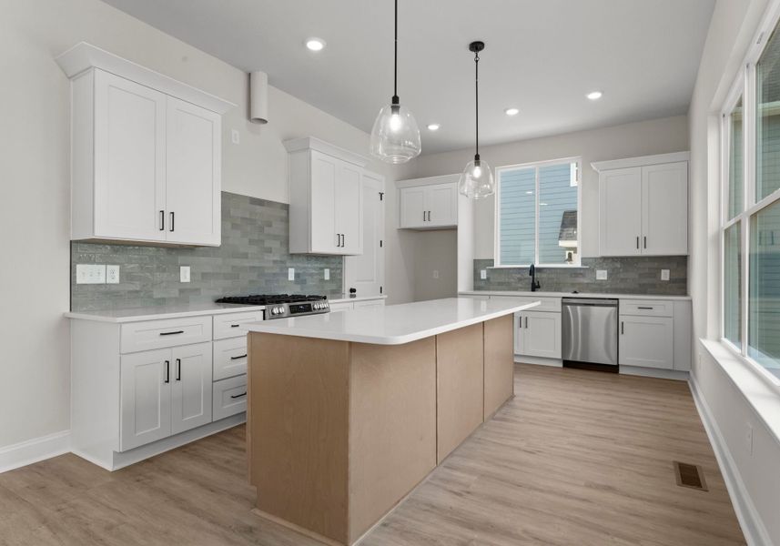 Representative furnished interior of a home built from the Lily by Red Cedar Homes in Cedars at First Street, Huntersville (Image 8).