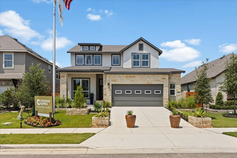 Front exterior of a new home in Meyer Ranch, New Braunfels, TX, highlighting curb appeal (Image 20).