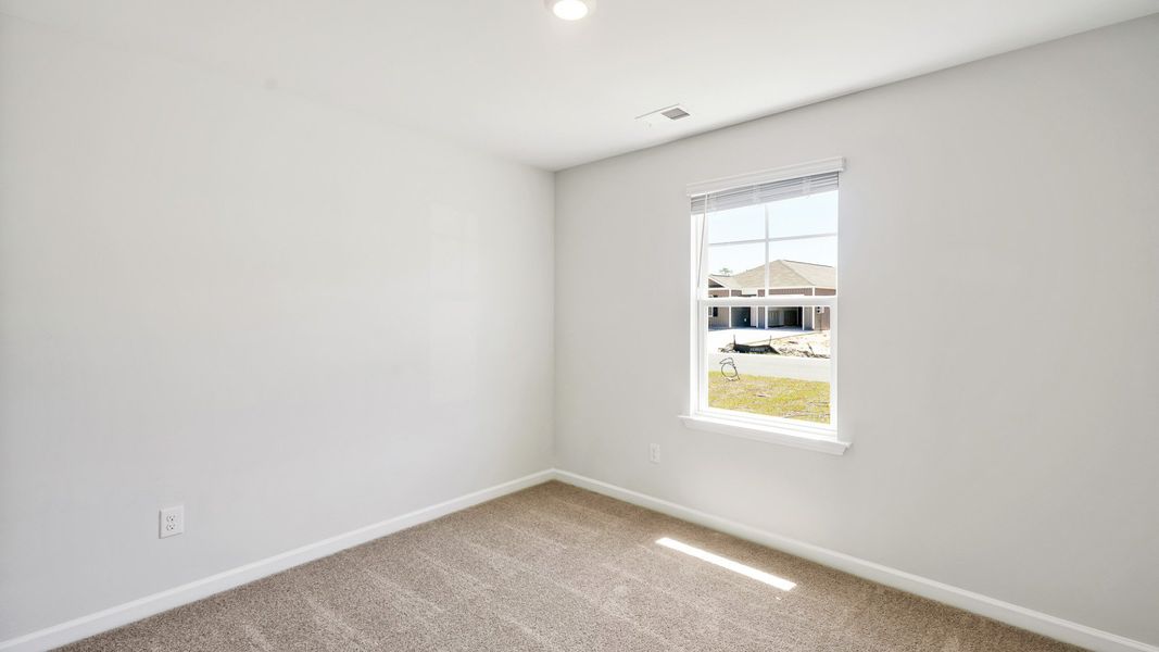 Spacious, unfurnished interior of a new home in Lockwood Landing, Supply (Image 10).
