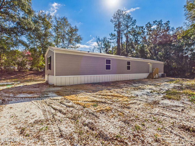 Exterior details and patio area of a home in , Hawthorne (Image 17).