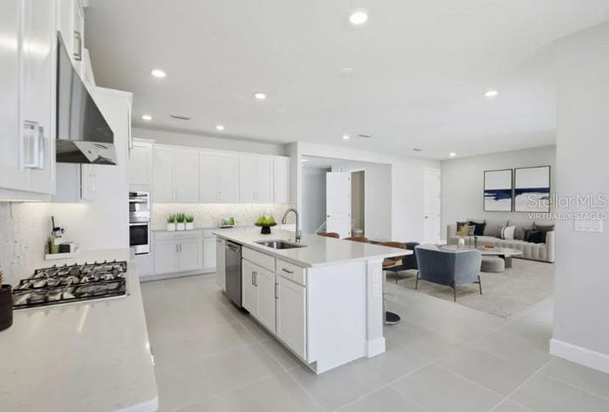 Furnished interior view inside a new home in Harvest at Ovation, Winter Garden (Image 8).