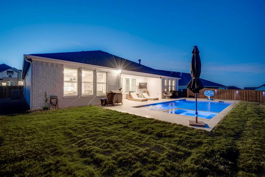 Exterior details and patio area of a home in Sweetgrass, Haslet (Image 27).
