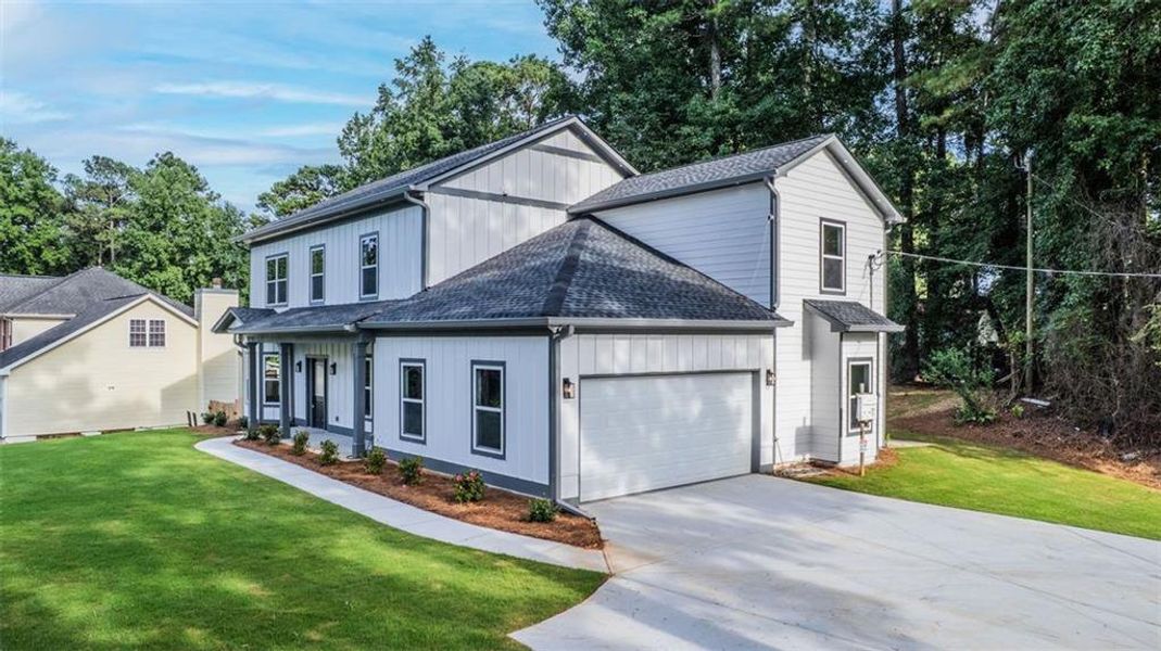 Front exterior of a new home in , Lithonia, GA, highlighting curb appeal (Image 21).