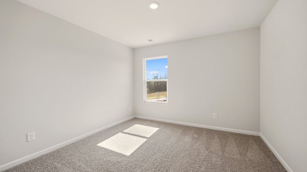 Spacious, unfurnished interior of a new home in Brookland Commons, Monroe (Image 19).